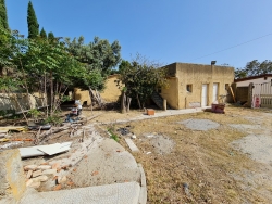 Terreno + Rudere + Locale Commerciale + Appartamenti Arangea